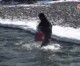 Video:Children have to cross the cold water to go to school